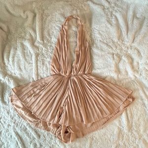 Lioness from Dolls Kill Deep Plunge with Open Back, Haltered Romper